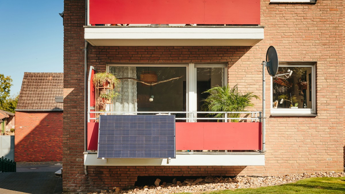 Adjustable balcony bracket geometry: maximizing winter low-sun harvest versus su